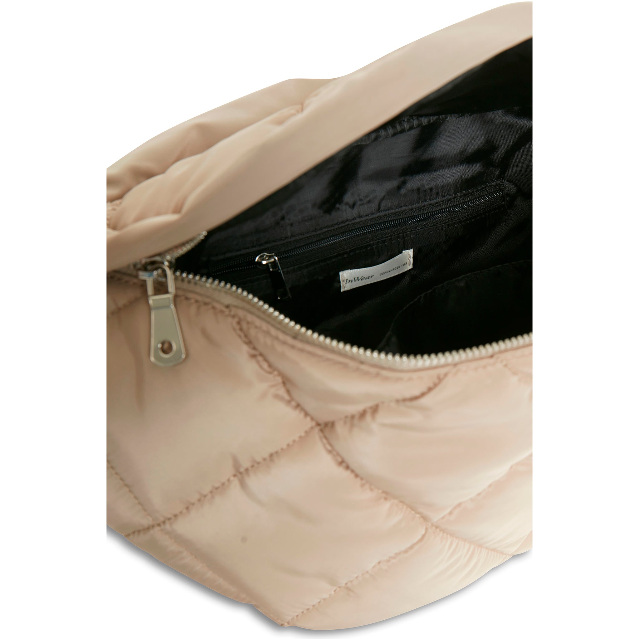 In Wearin ns. crossbody laukku. Beige tikkikangas, musta vuori. Lähikuva.