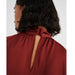 In Wearin pusero Koto Syrah yksityiskohta takaa